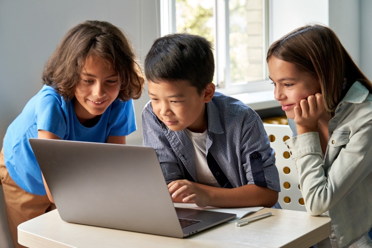 wi-fi-for-schools-three-kids-laptop
