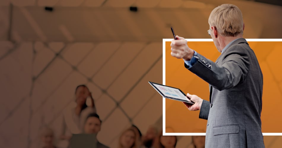 Professor-teaching-with-tablet-classroom-higher-ed