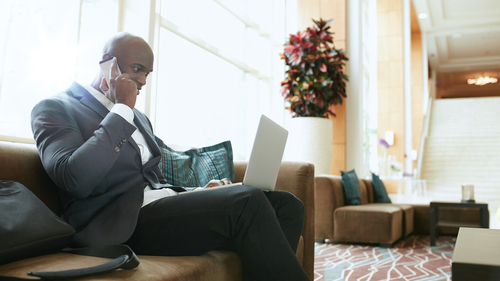 hospitality_man_devices_lobby.jpg 500x334 500 x 334